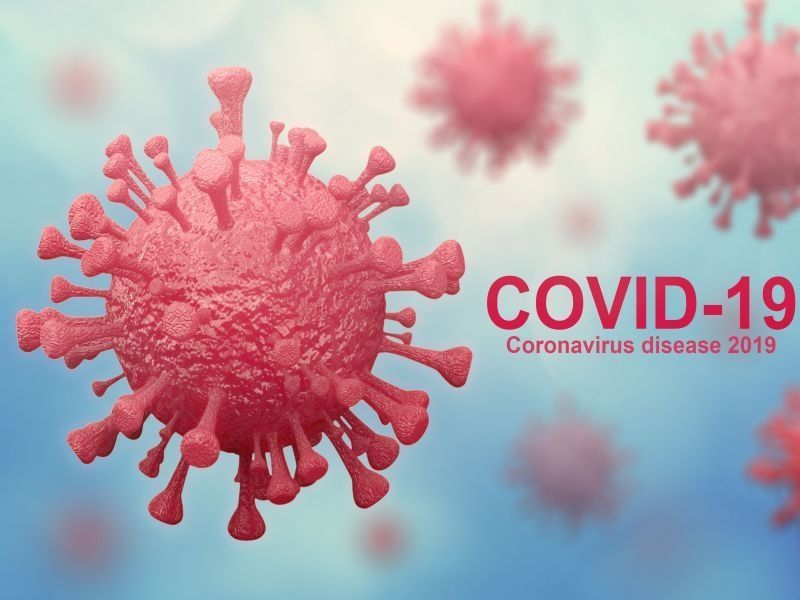 red coronavirus cell on blue background with text covid-19 coronavirus disease 2019